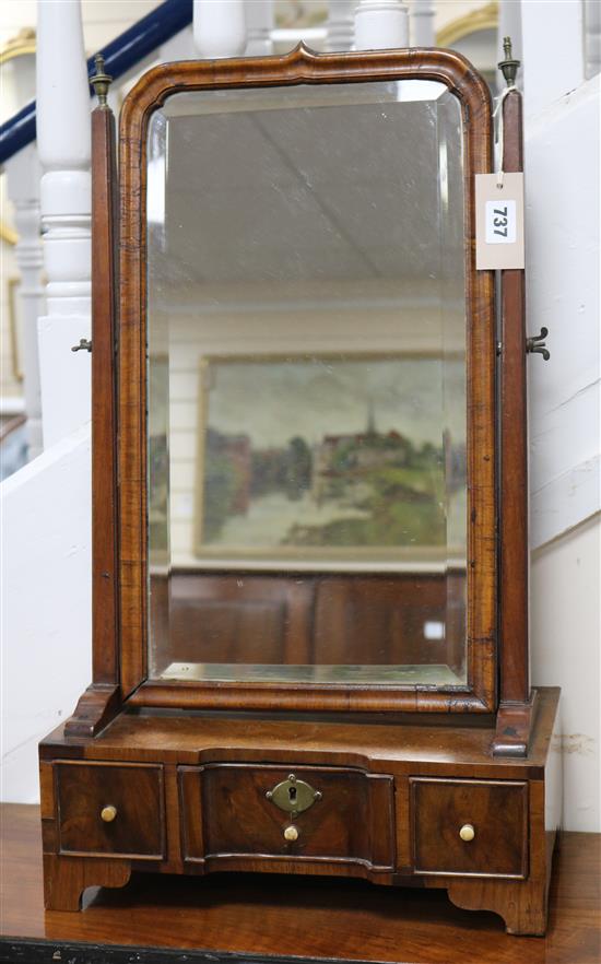 A walnut toilet mirror, H.65cm